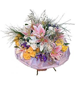 bouquet of roses lilies and irises
